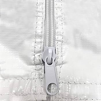 the zipper portion of a white vinyl event tent wall